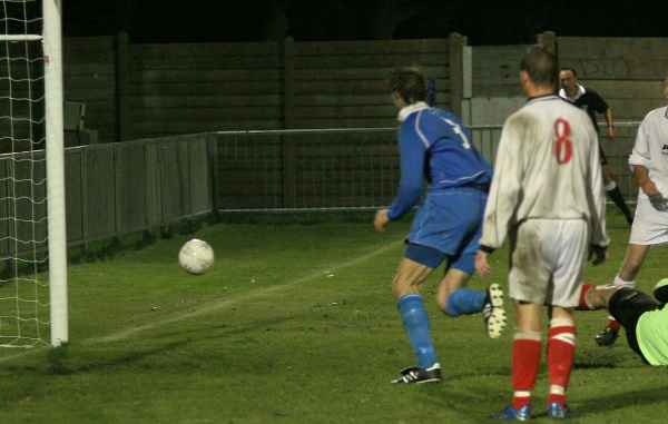 Richard Carter (hidden) puts Shoreham 4-3 up in extra time
