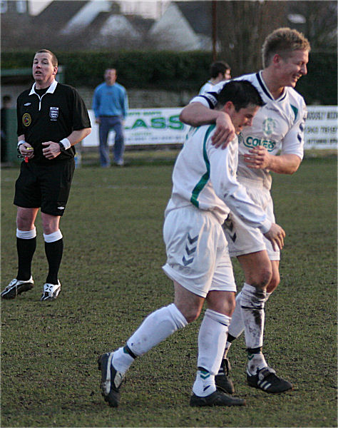 ... but Alex Ward congratulates Callum Cutler on the equaliser 60 seconds later
