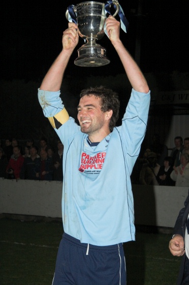 Chris Morrow displays the cup
