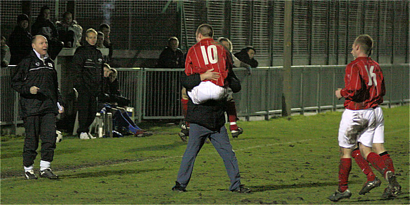... and Matt celebrates with manager Vic Short
