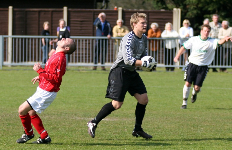 Matt Huckett is frustrated as Anthony Ender grabs the ball  
