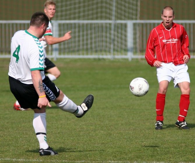 Ian Saunders sends the ball downfield
