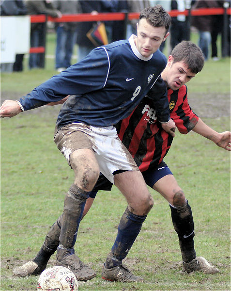 Mark Dixon tackles Dave Walker
