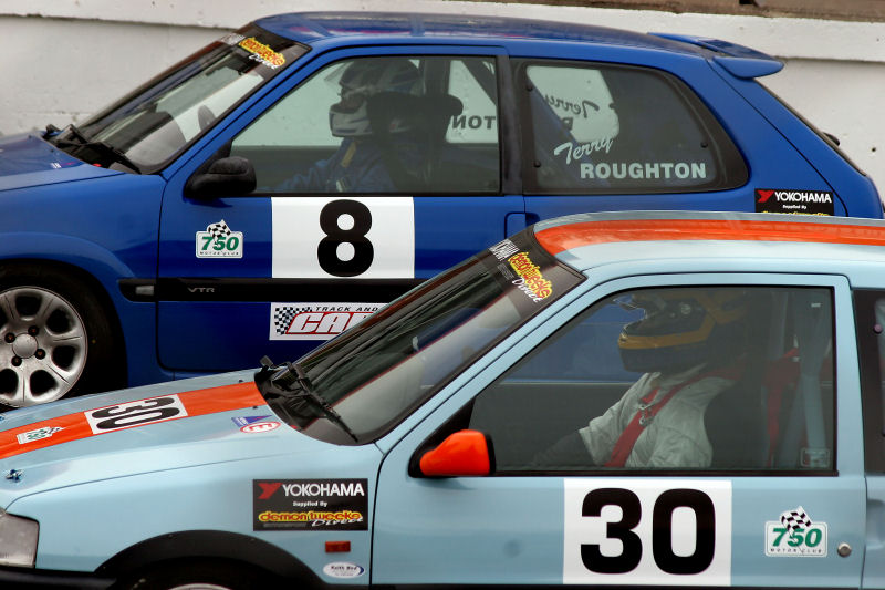 Terry Roughton (8) Citroen Saxo and Darren Wilson (30) Peugeot 106 XSi wait  for the start of the Stock Hatch Final
