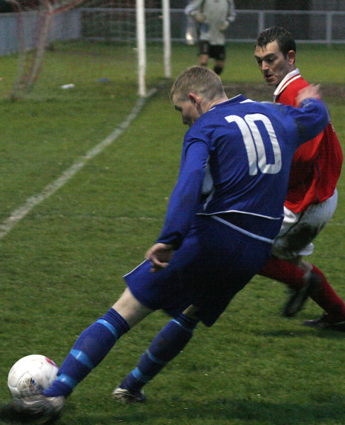 James Highton (10) gets a cross in from near the corner flag
