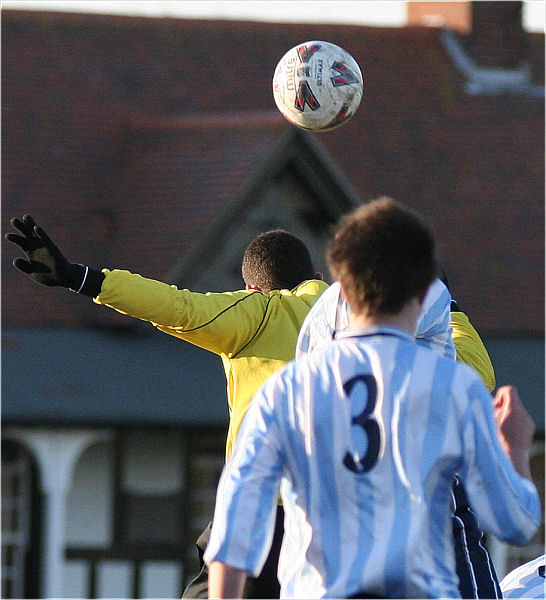 Derek Chester competes for a header
