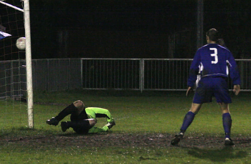Kevin Clayton (3) watches as Matt Grieve makes another great save
