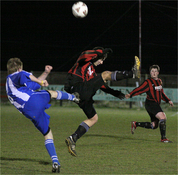 Tom Manton tries to block Ashley Dugdale's clearance
