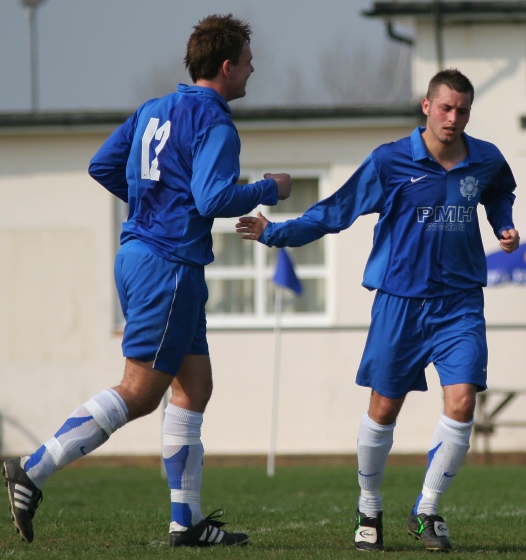 Sean Duffy is greeted by Ryan Walton after scoring
