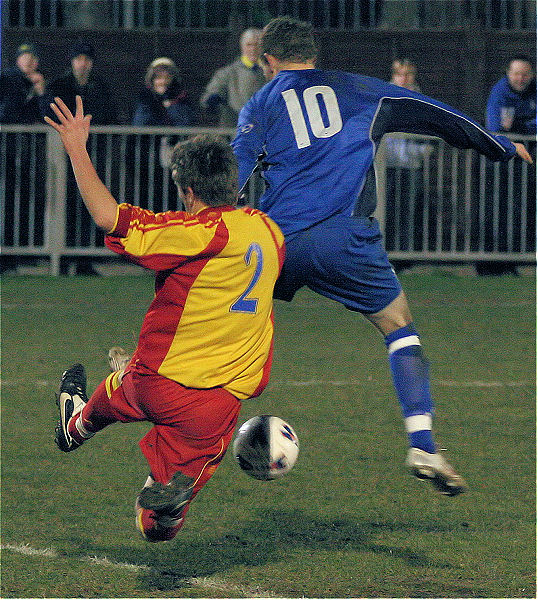 Scott Edwards (2) tackles James Highton (10)
