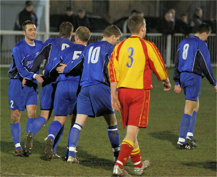 Rustington celebrate their third goal, scored by James Highton (10)
