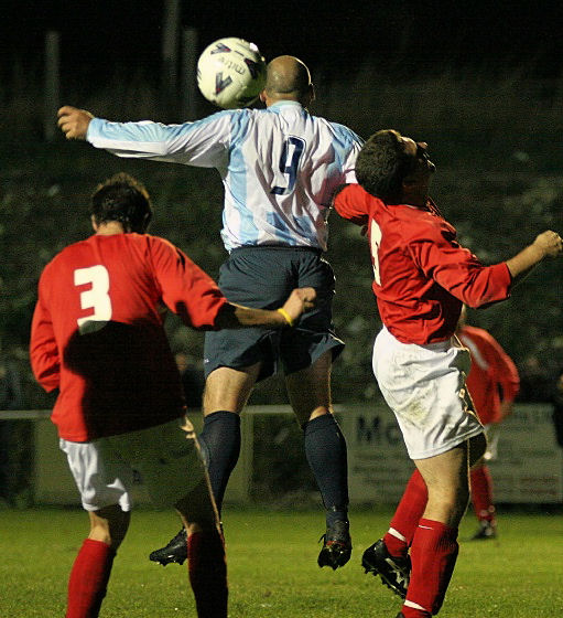 Mark Price (9) climbs above Josh Sutcliffe (3) and Stuart Hack (5)
