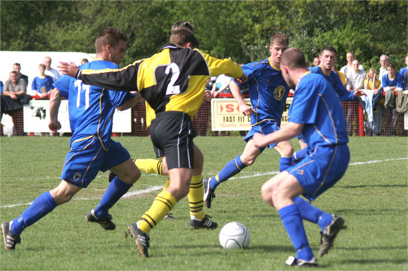 Nicky Sullivan (2) races between Chris Gell (11) and Mark Cooper (5)
