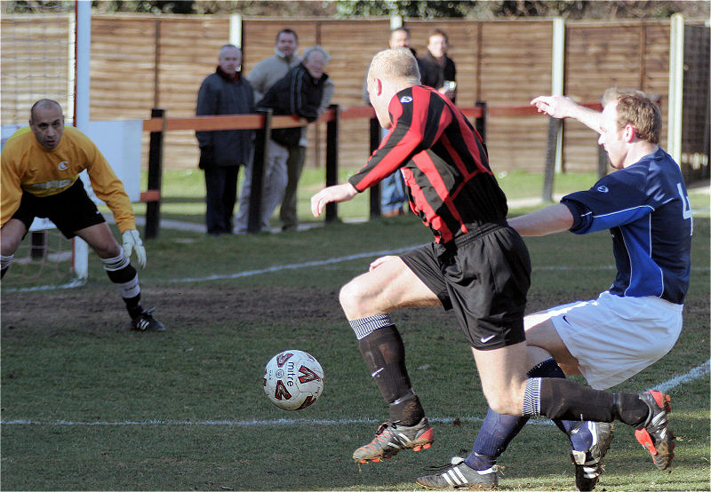 Kane Evans jumps this tackle by Phil Rhodes
