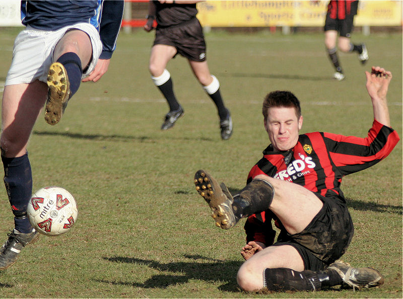 Tom Bird slides in to a tackle
