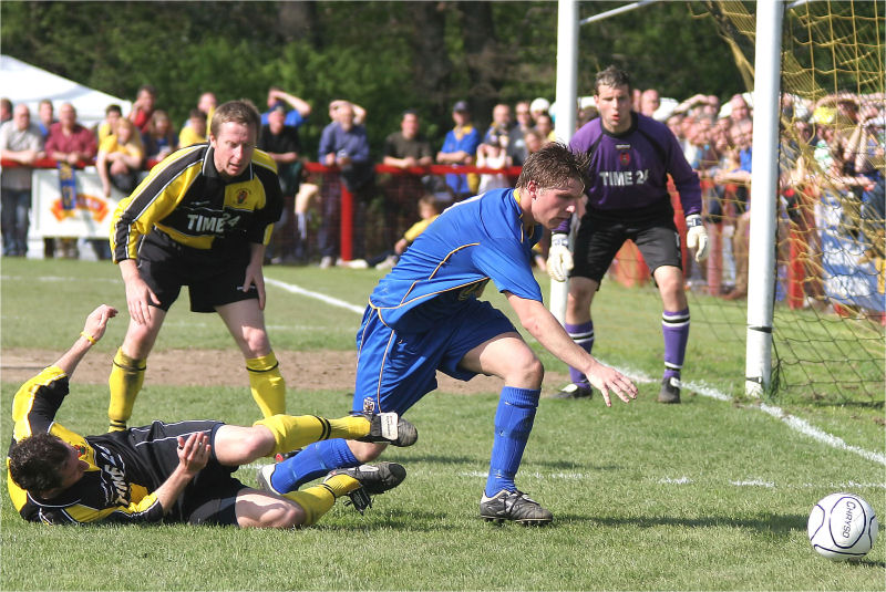 Richard Butler just gets away from this tackle
