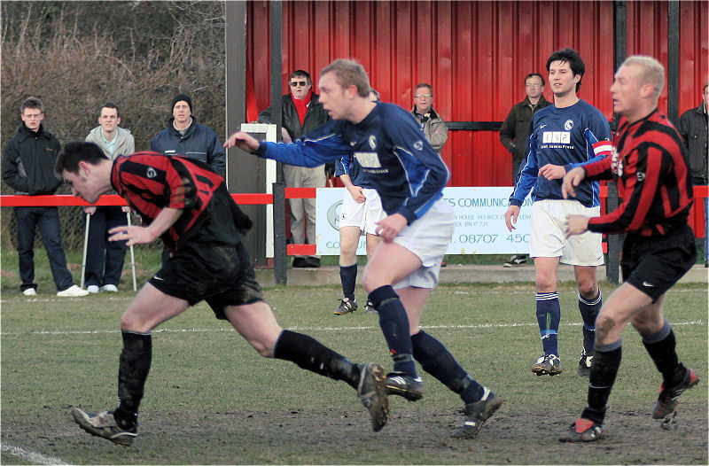 Tom Bird is first to the ball ...
