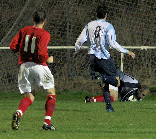 Simon Clayton, who replaced injured Ben O'Connor in goal, got down well to smother this shot
