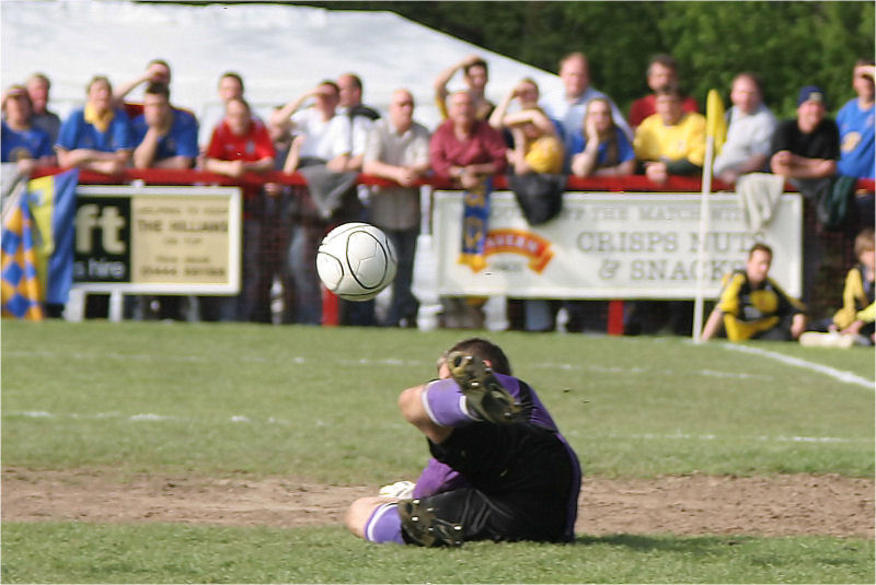 John Sullivan smothers this shot from Leon McDowall
