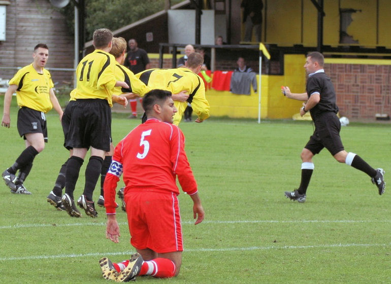 Danny Swain is congratulated on opening the scoring after 6 minutes
