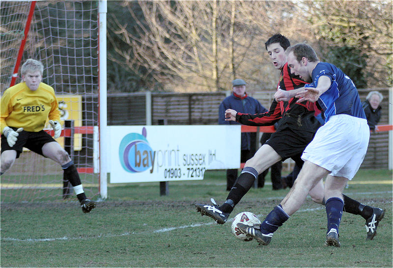 Dave Sharman gets across to block Phil Rhodes
