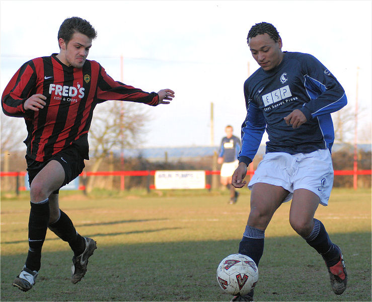 Wes Tate is watched closely by Mark Dixon
