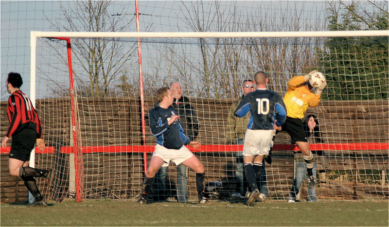 Kush Movaffagh reacts quickly to Pete Christodoulou's header late in the game
