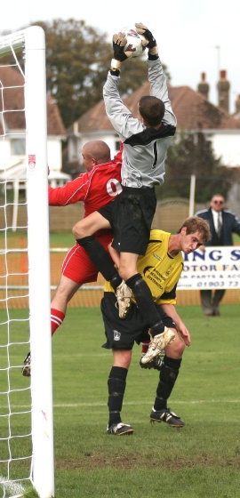 Jon Hendricks climbs high for this catch
