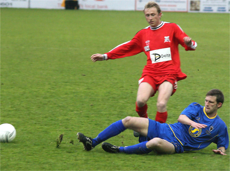 A great 'Frankie' Howard tackle takes the ball away from Paul Harkness
