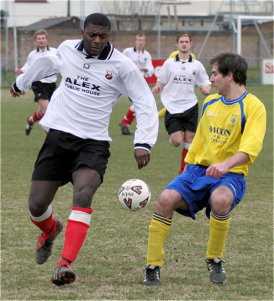 Sean David about to be tackled by Christian Troak
