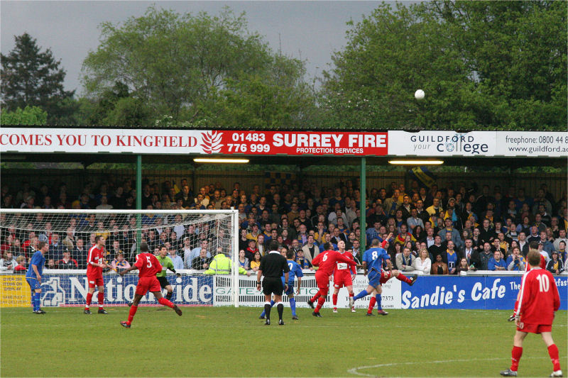 Walton & Hersham clear a Dons attack
