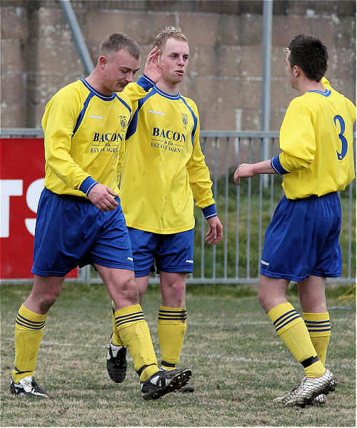 Rob Partridge is congratulated on scoring for Lancing
