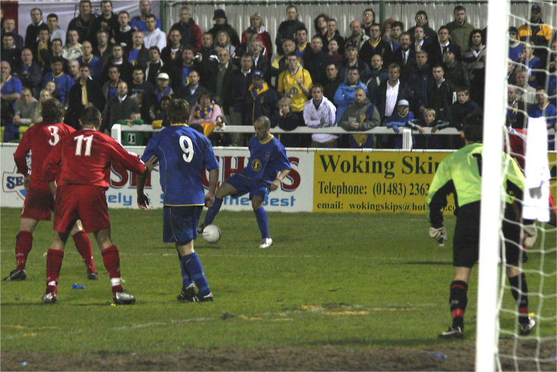 Ryan Gray puts more pressure on the Walton & Hersham defence
