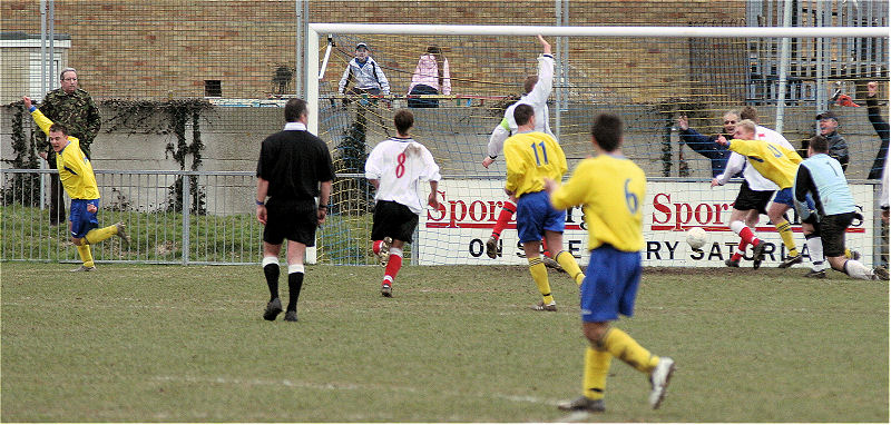 Matt Balmer (far left) grabs Lancing's winner on 73 minutes ...
