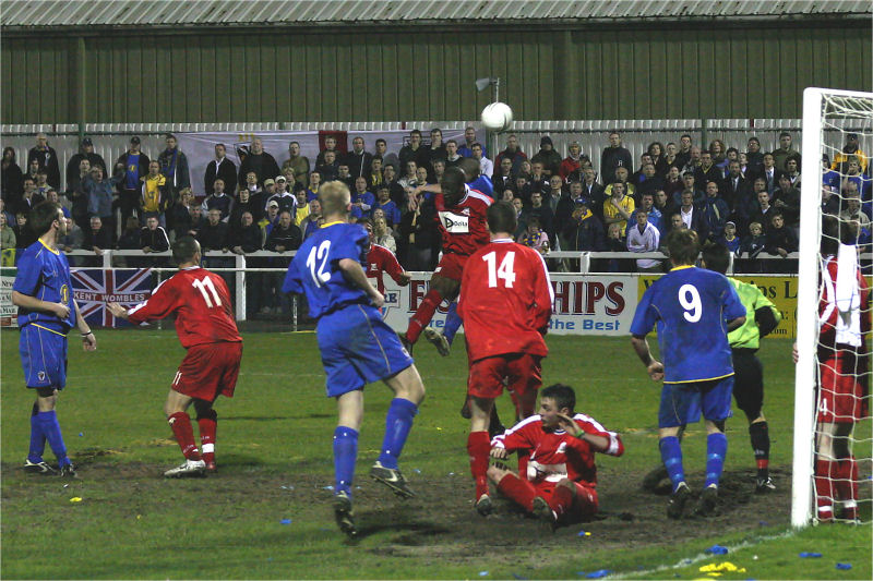 Wimbledon keep up the pressure with Steve Butler (12) joining the attack
