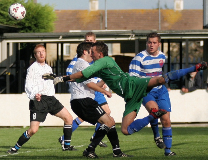 Saltdean keeper Carl Smeaton makes a good interception
