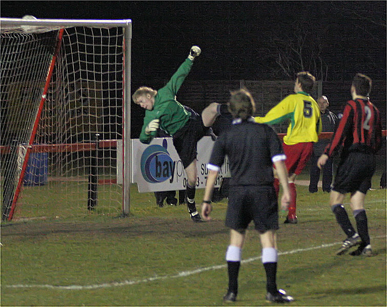 Tom Rand makes a great save from a free kick dipping  into the top corner

