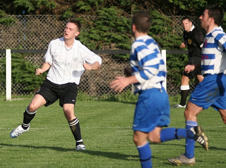 Joe Nicholson loops the ball over the keeper for number 7 to East Preston
