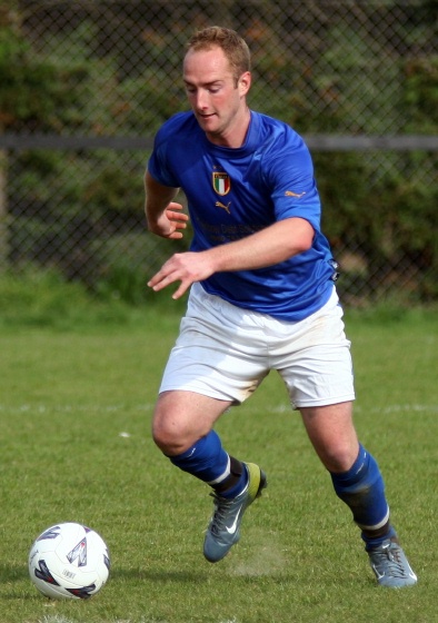 Danny Cooper lines up the shot for AC Azzurri's second
