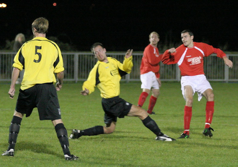Simon Clayton (background) watches as his shot finds the net to level it up on 17 minutes ...
