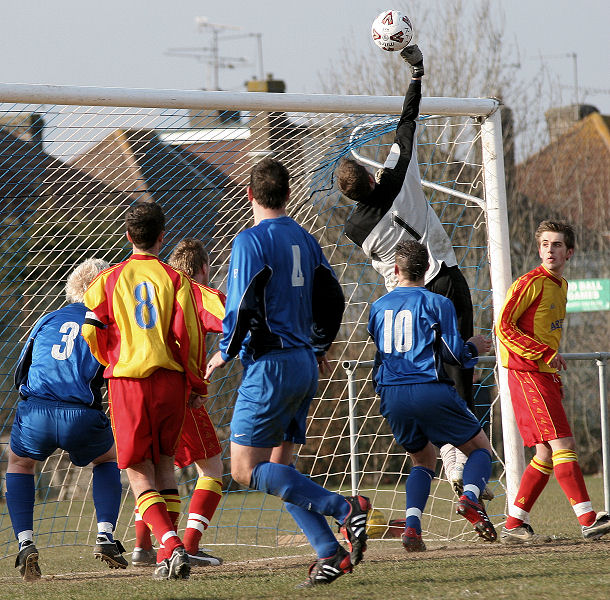 Mark Hildersley tips an inswinging Dave Oakes corner over the bar
