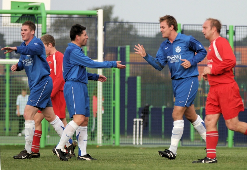 ... and he is congratulated by Terry Withers
