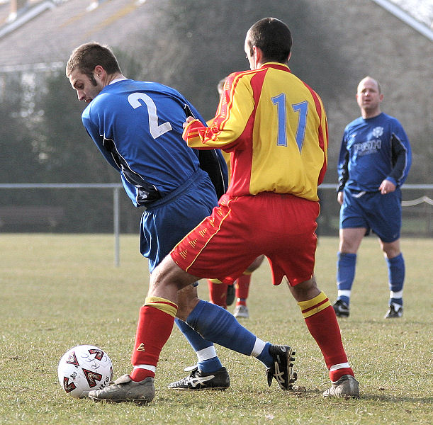 Sean Duffy (2) turns past Jamie Bartholomew
