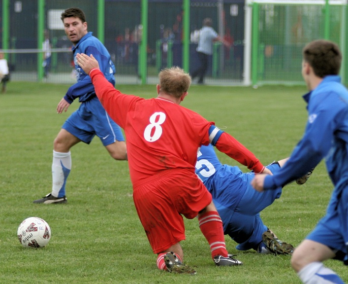 Steve Kirkham is tackled by Dave Connor
