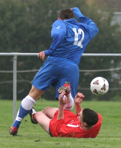 Craig Cox is tackled
