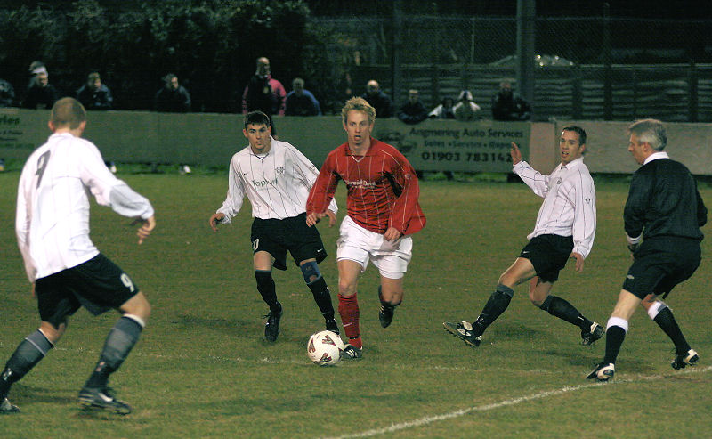 Mike Huckett goes past Josh Biggs, Sonny Banks and Ryan Hudson 
