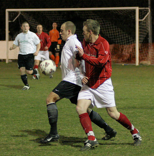 Josh Biggs is hassled by Lee Barnard
