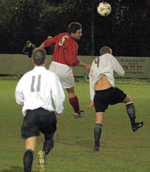 Stuart Hack clears from Josh Biggs
