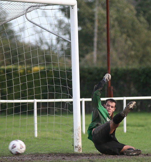 ... and sends keeper Matt May the wrong way on 89 minutes. 
