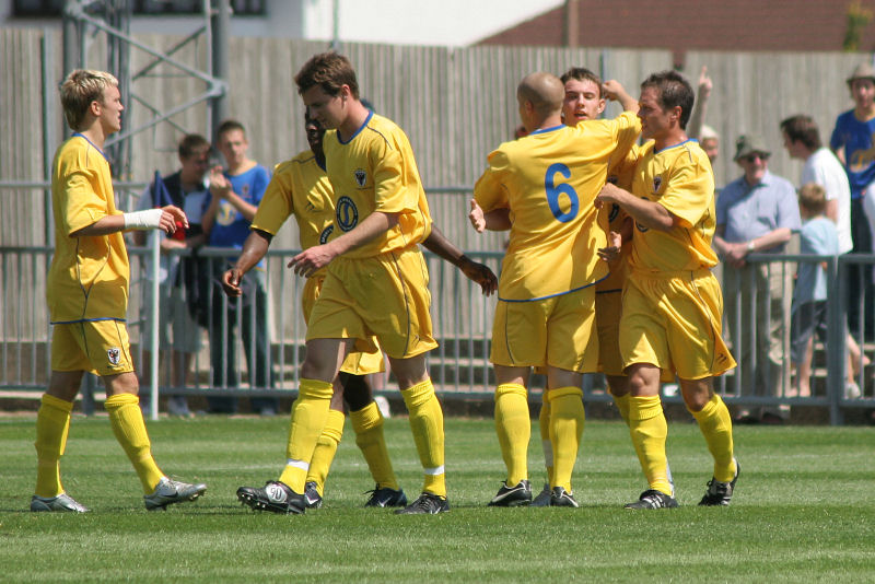 Sonny Farr is congratulated on opening the scoring
